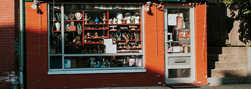 A small orange business exterior in the morning